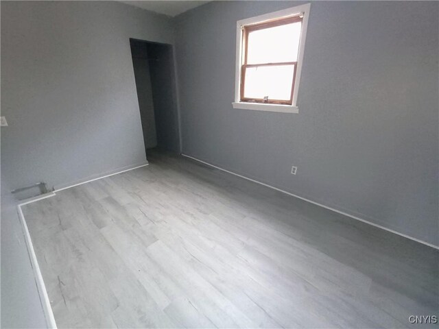 812 Kirkpatrick St, Syracuse, NY 13208 - empty room with wood finished floors
