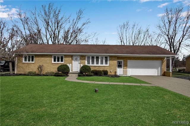 single story home featuring brick siding, a garage, concrete driveway, and a front yard