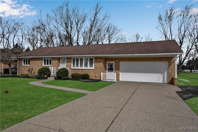 ranch-style home with brick siding, driveway, an attached garage, and a front yard