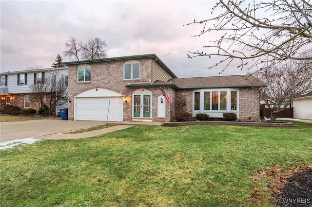 view of front facade featuring concrete driveway, an attached garage, brick siding, and a front yard