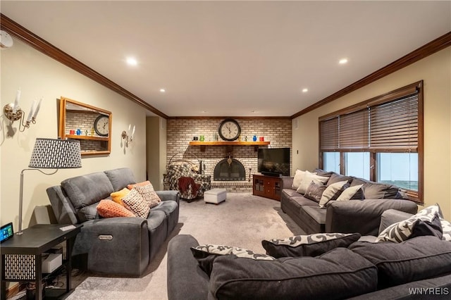 living room with a brick fireplace, brick wall, ornamental molding, carpet floors, and recessed lighting