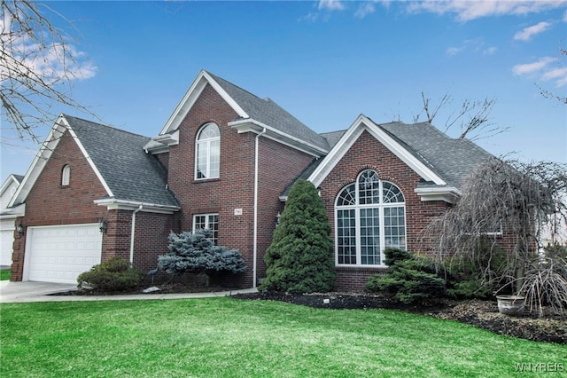 traditional-style house featuring a front lawn and brick siding