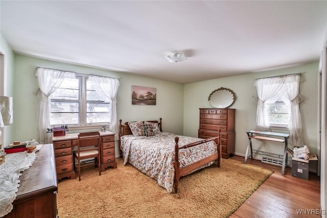 bedroom featuring light wood-type flooring