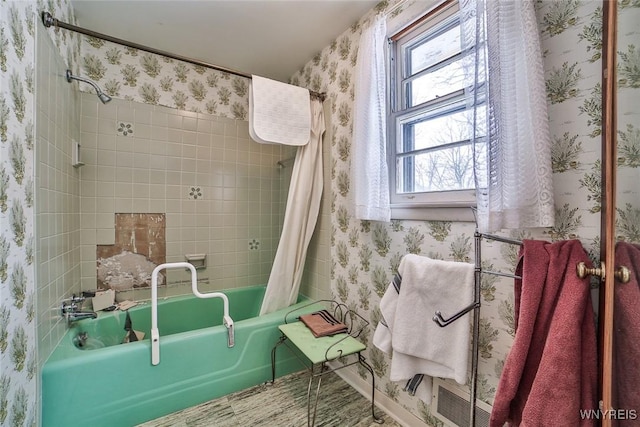 full bath featuring shower / bath combination with curtain and wallpapered walls