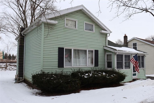 view of snow covered property