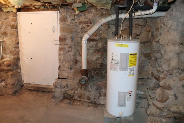 utility room with water heater