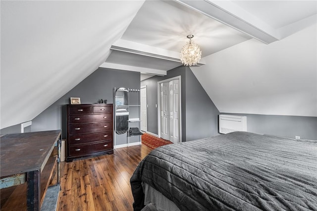 bedroom with lofted ceiling with beams, a notable chandelier, a closet, and wood-type flooring