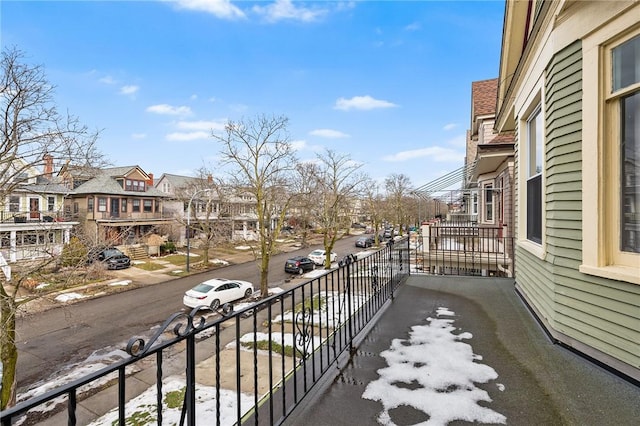 balcony featuring a residential view