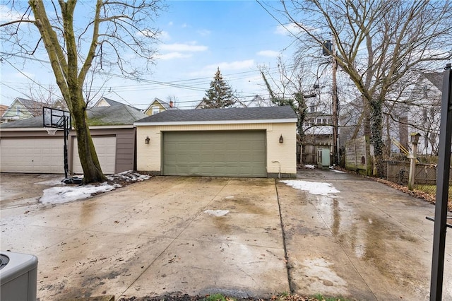 detached garage with fence