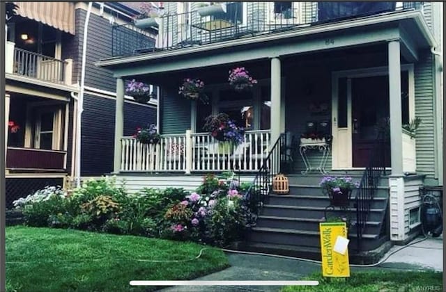 entrance to property with a porch