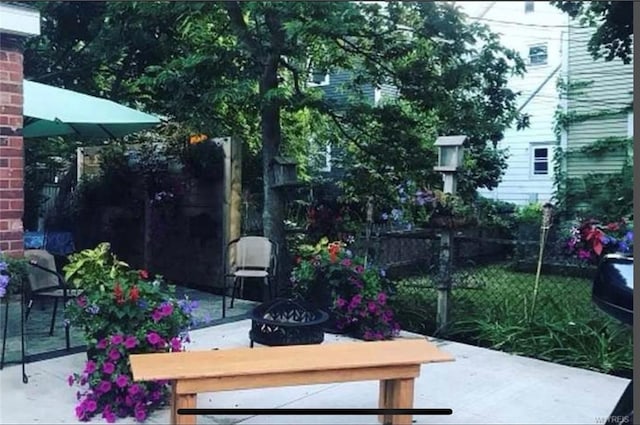 view of patio / terrace featuring a fire pit