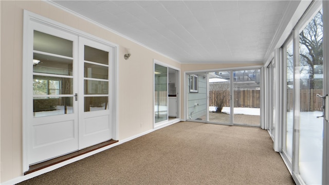 view of unfurnished sunroom