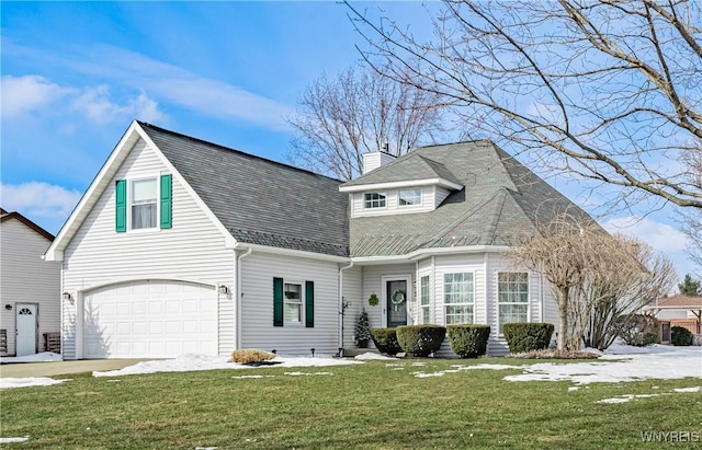 view of front of property with driveway, a chimney, a front yard, and a shingled roof