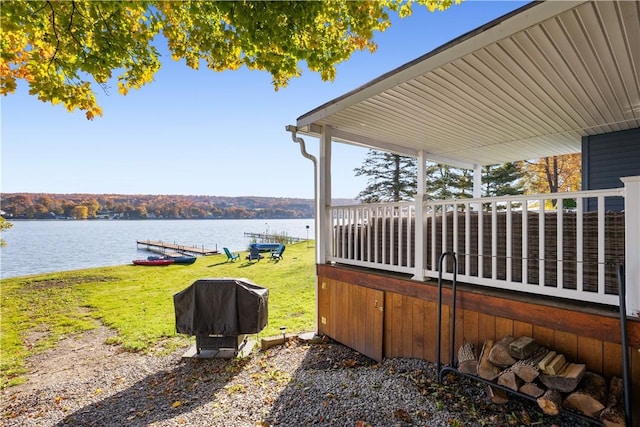 view of patio / terrace with a water view