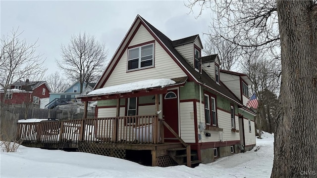 view of front of home featuring fence