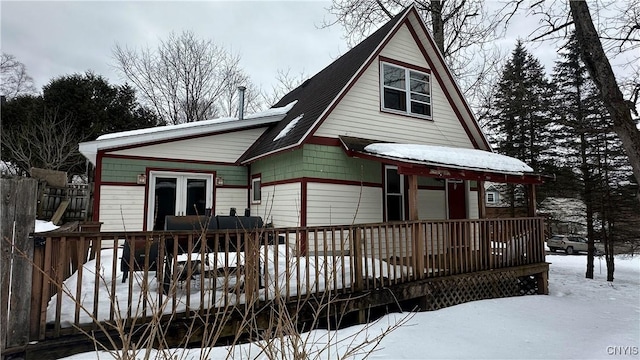 view of front facade with a wooden deck