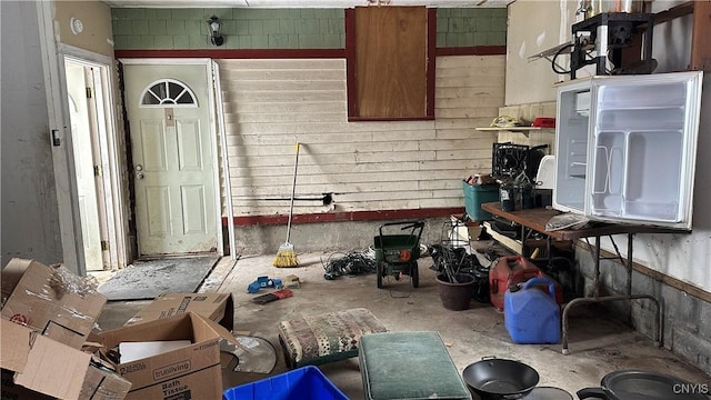 kitchen with unfinished concrete flooring