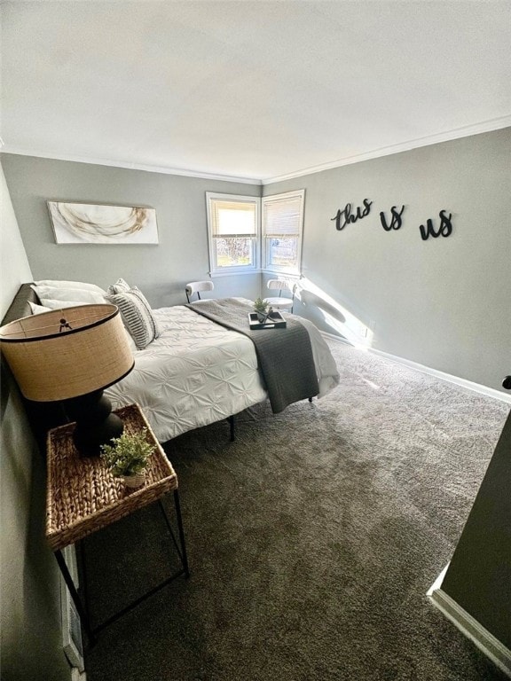 carpeted bedroom with baseboards and ornamental molding