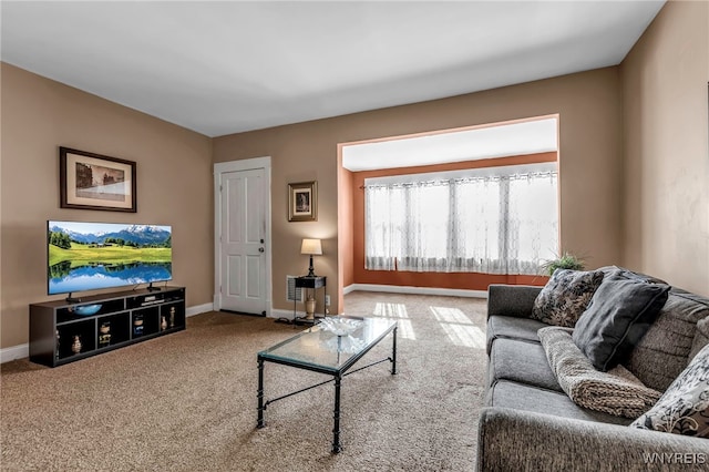 living room with carpet flooring and baseboards