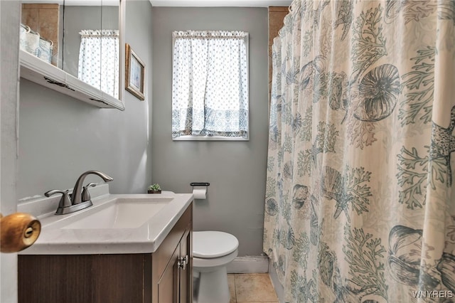 bathroom with vanity, a shower with shower curtain, toilet, and tile patterned flooring