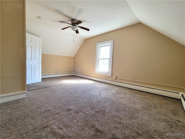 bonus room with baseboards, a ceiling fan, lofted ceiling, and carpet