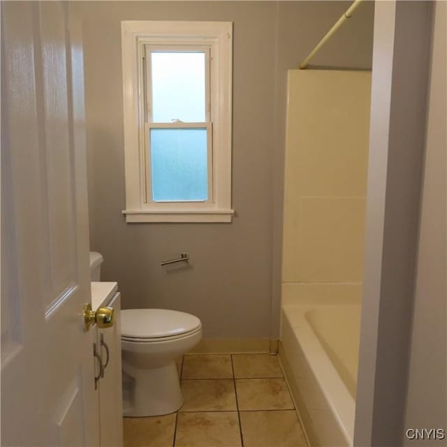 full bath with tile patterned flooring, toilet, vanity, and baseboards