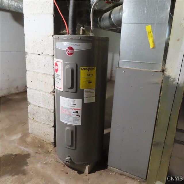 utility room with electric water heater