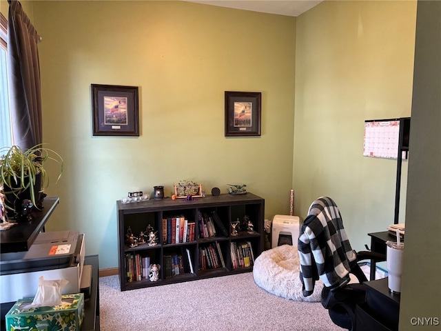 carpeted office space with baseboards