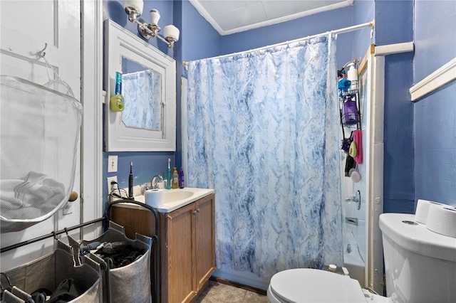 bathroom with toilet, crown molding, vanity, and shower / bath combination with curtain