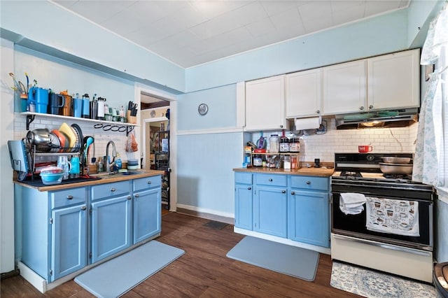kitchen featuring a sink, blue cabinetry, gas stove, and exhaust hood