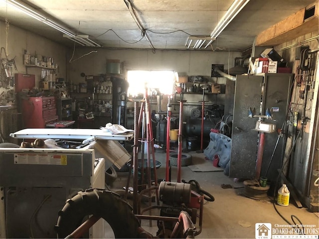 garage with a workshop area