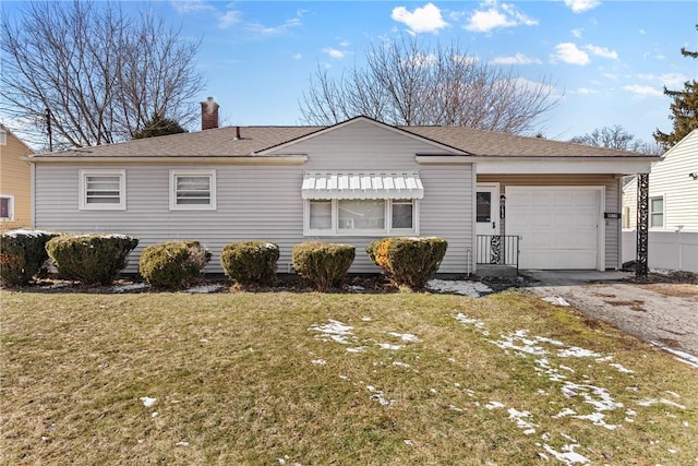 single story home featuring driveway, roof with shingles, a front yard, an attached garage, and a chimney