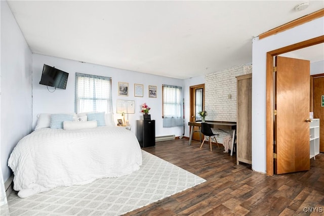 bedroom featuring dark wood-type flooring, multiple windows, and baseboard heating