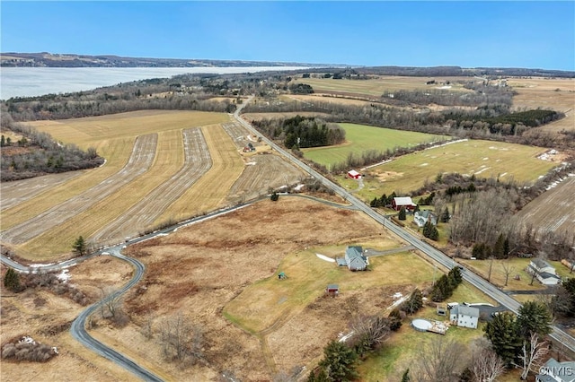 aerial view with a rural view and a water view