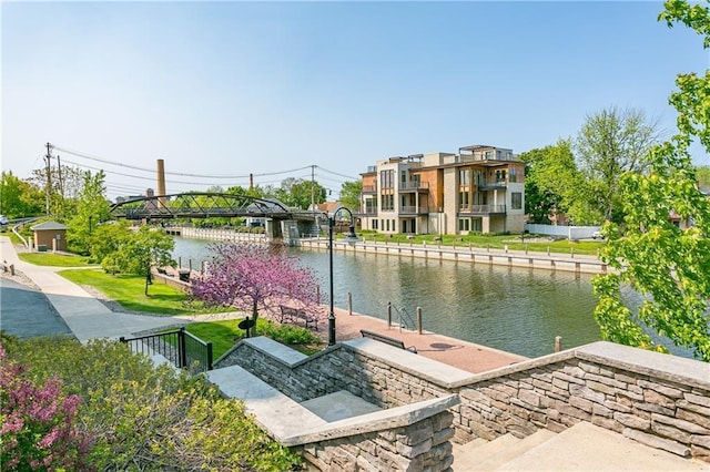 surrounding community featuring a water view