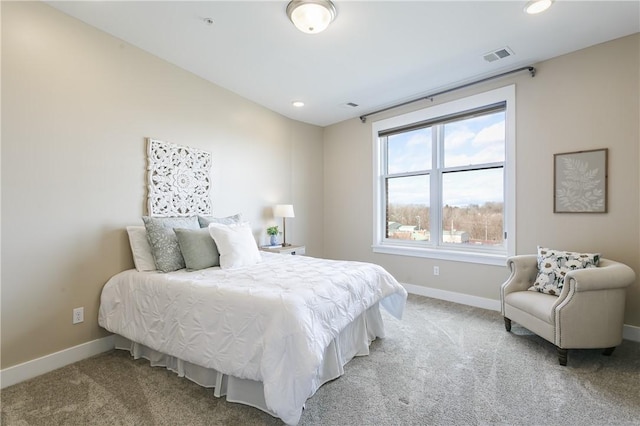 bedroom featuring recessed lighting, visible vents, light colored carpet, and baseboards