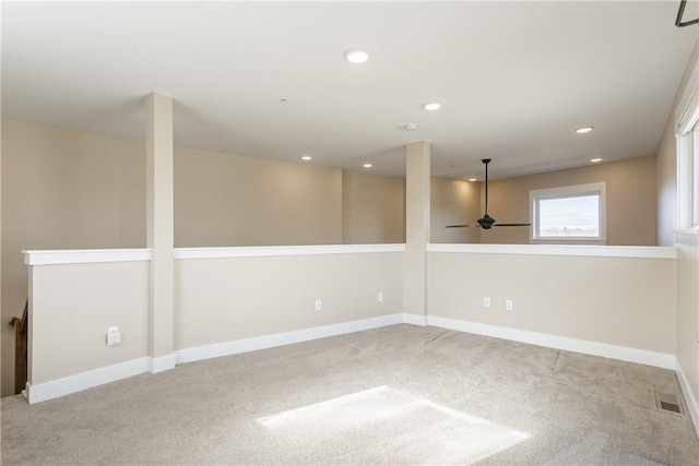 basement with recessed lighting, carpet flooring, baseboards, and visible vents