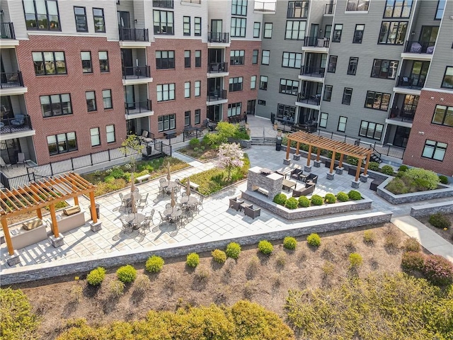 view of property's community featuring a pergola