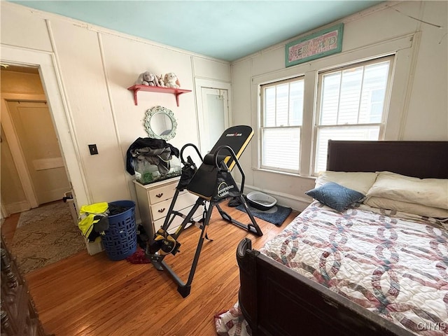 bedroom with wood finished floors