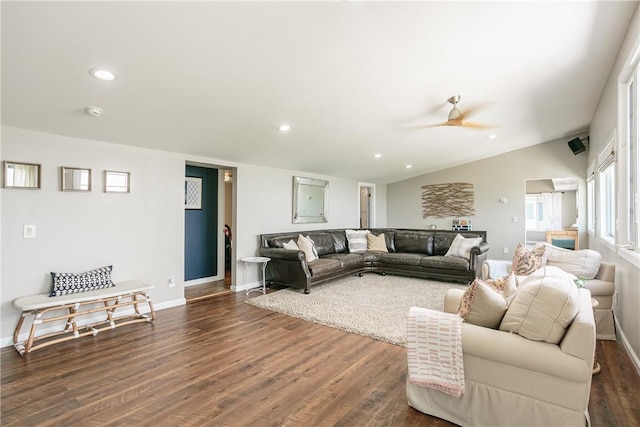 living area with lofted ceiling, recessed lighting, dark wood-style flooring, and baseboards