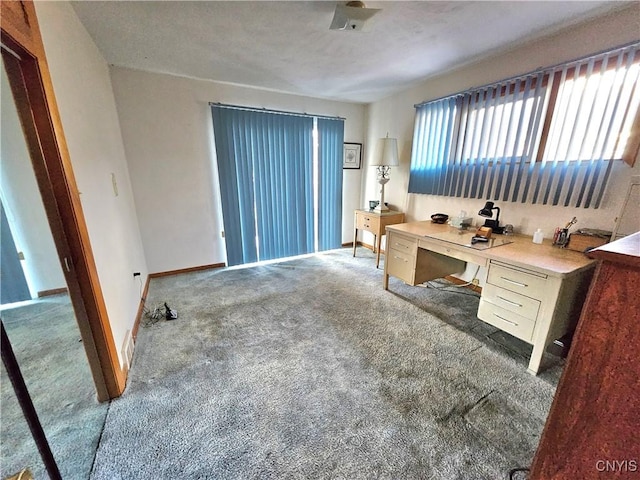 office area with baseboards and carpet