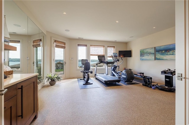 workout room with baseboards