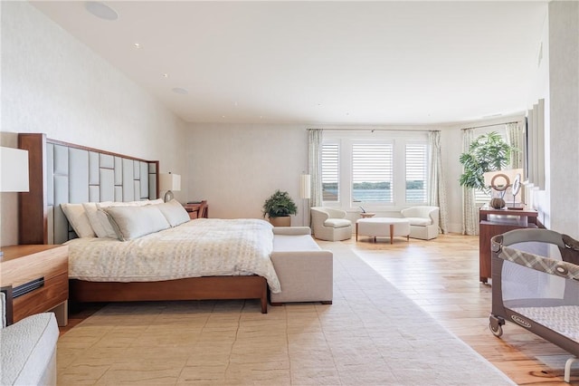 bedroom with light wood-style floors