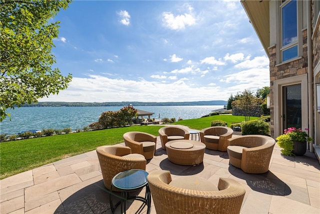 view of patio / terrace featuring a water view