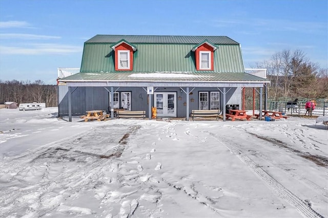 view of snow covered property