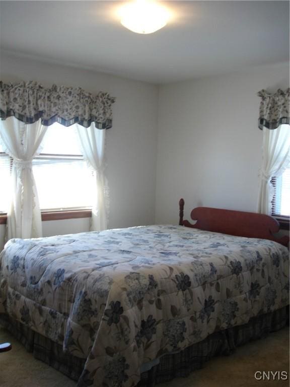 bedroom featuring carpet flooring