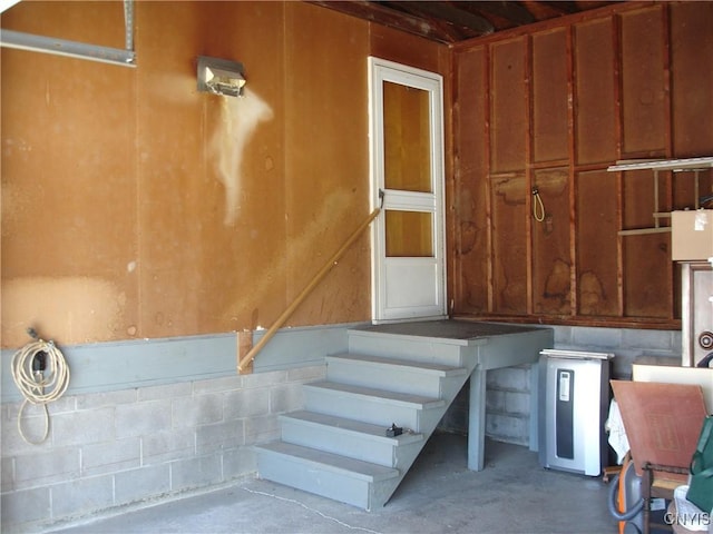 basement featuring concrete block wall