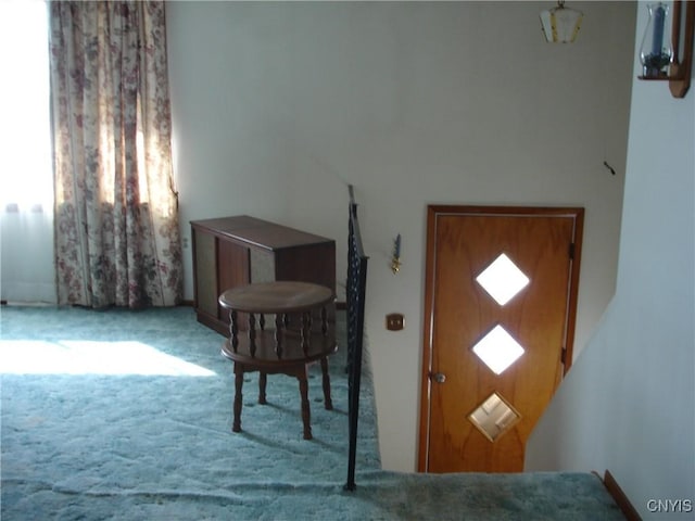 entryway featuring carpet