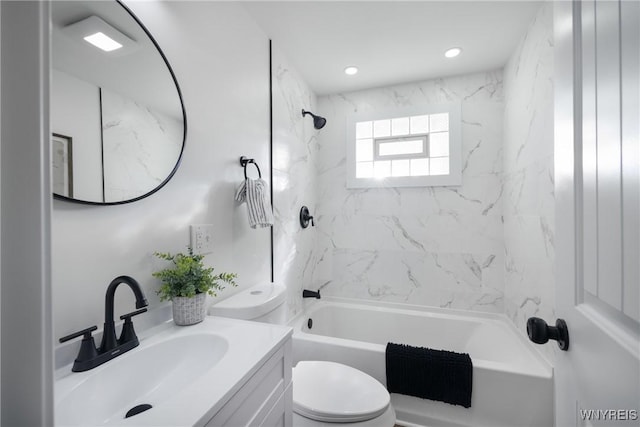 bathroom featuring recessed lighting, toilet, vanity, and  shower combination