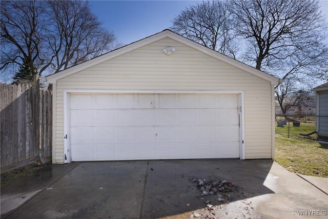 detached garage with fence